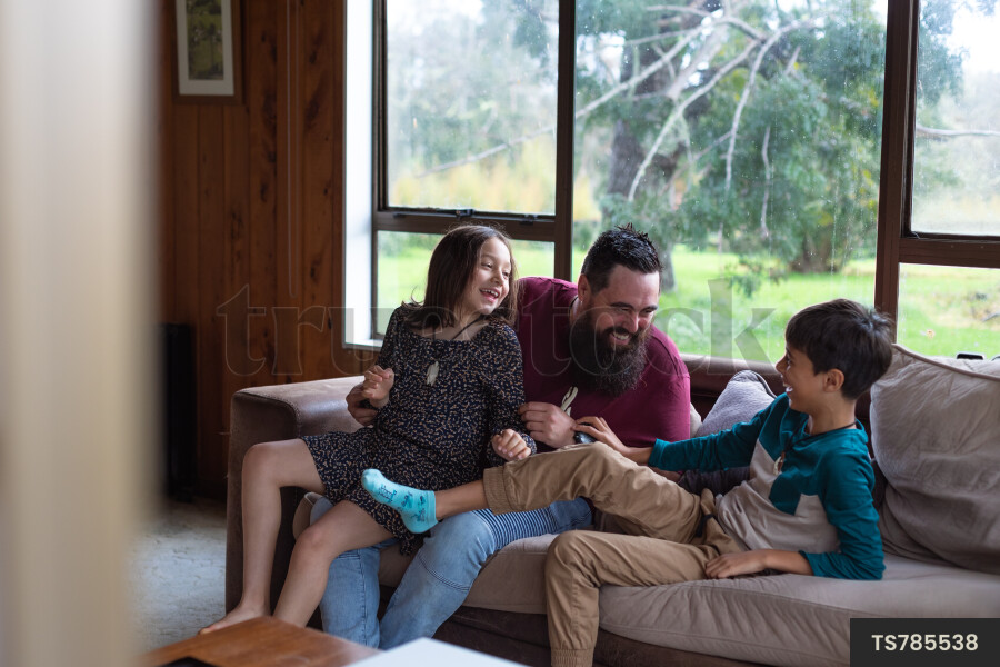 Father and Kids on Couch