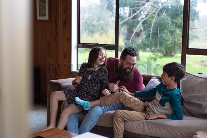 Father and Kids on Couch