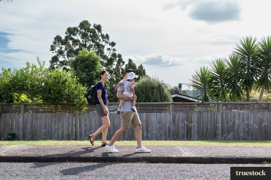 Family walking along road