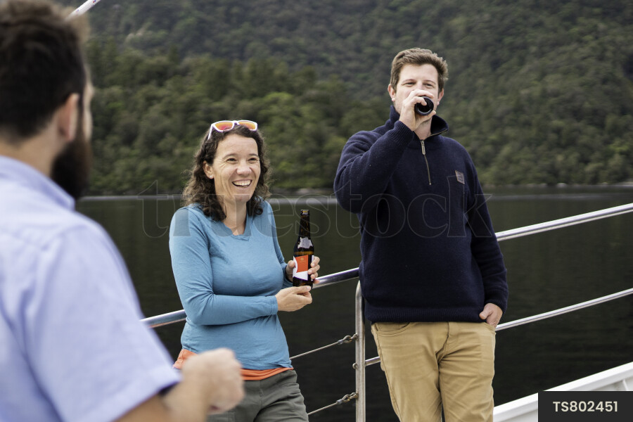 Tourists Enjoying Beer on Boat