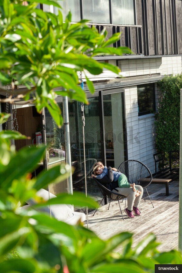 Mother and son hugging