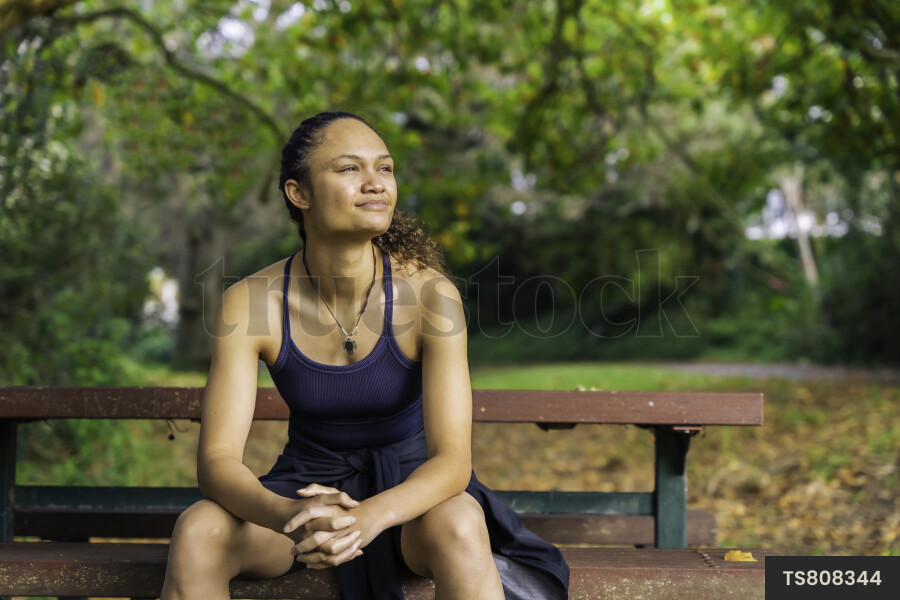 Teen Girl Having Break on Bench