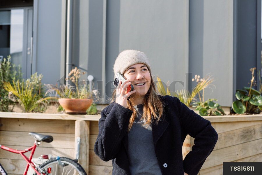 Young woman talking on smart phone