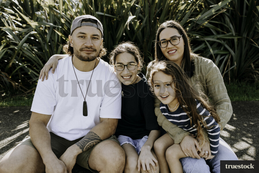 Family Photo in front of Flax