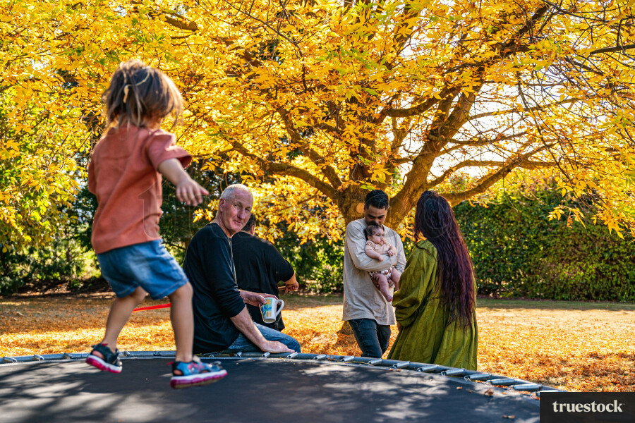 Child Playing on Trampoline