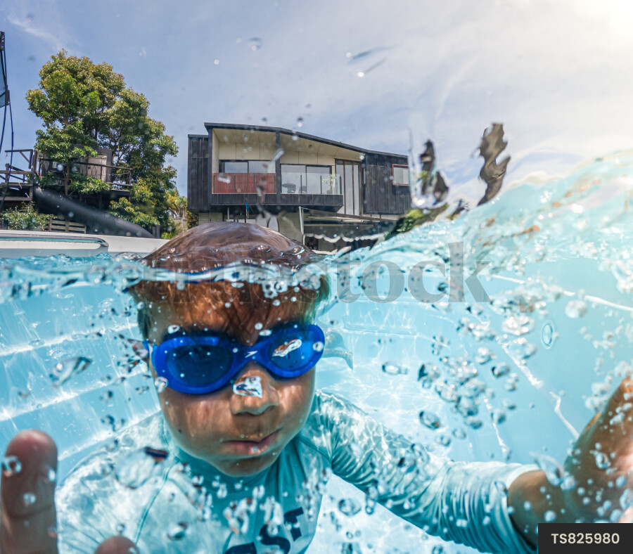Kids Swimming in Pool