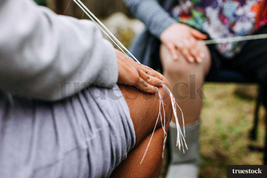 Moari culture weaving ropes