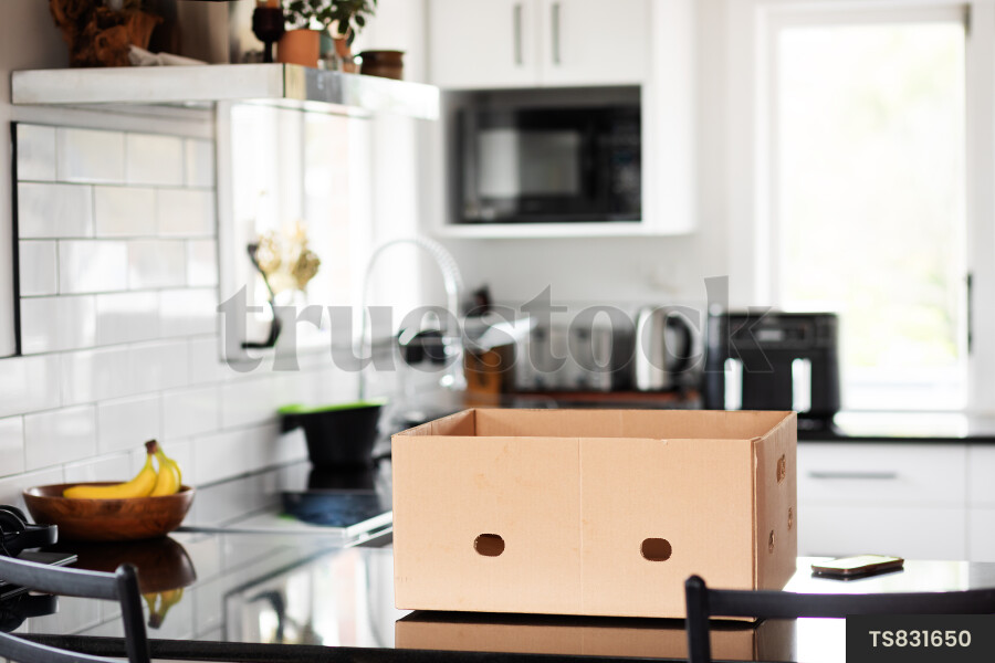 Cardboard box in kitchen