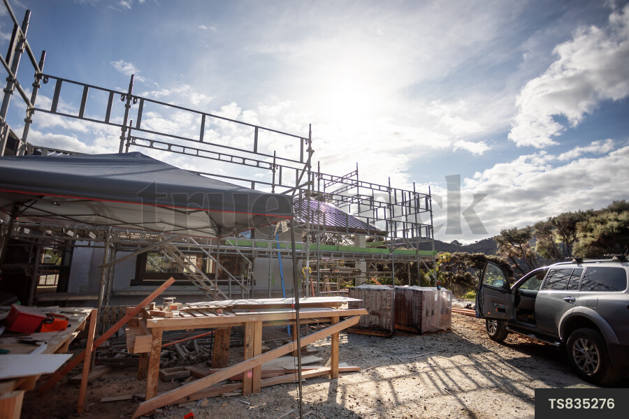 Pickup truck and workbench in construction site
