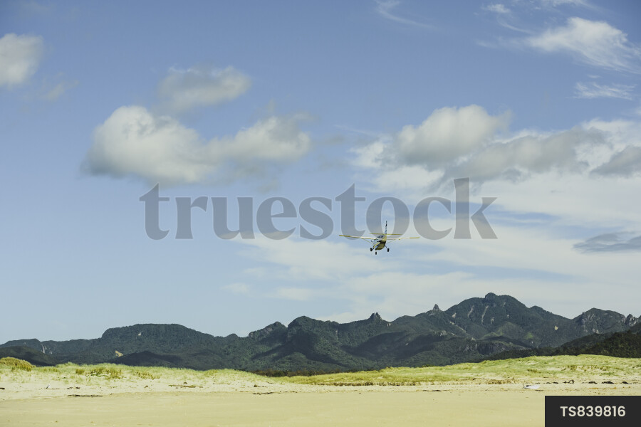 Helicopter Flying Over Beach