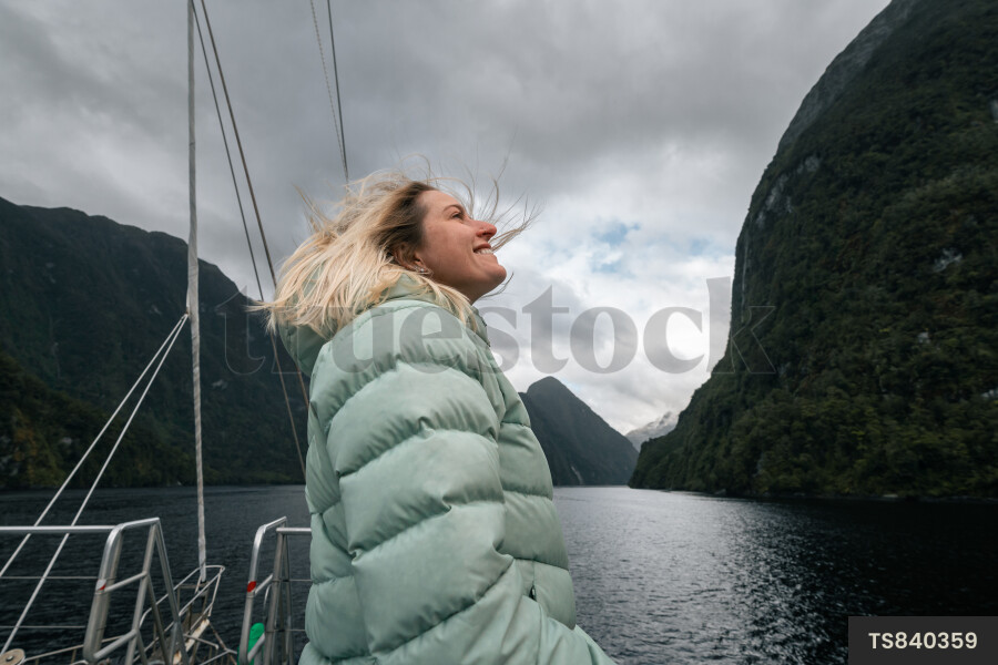 Woman on boat on Doubtful Sound