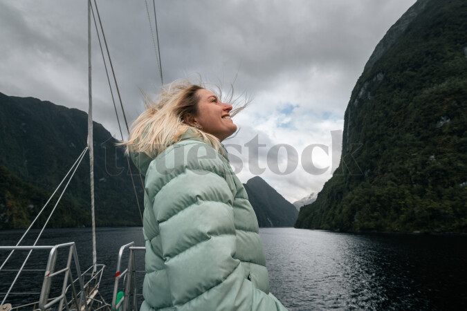Woman on boat on Doubtful Sound