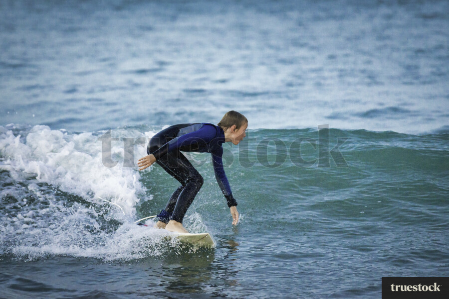 Young Boy Surfing