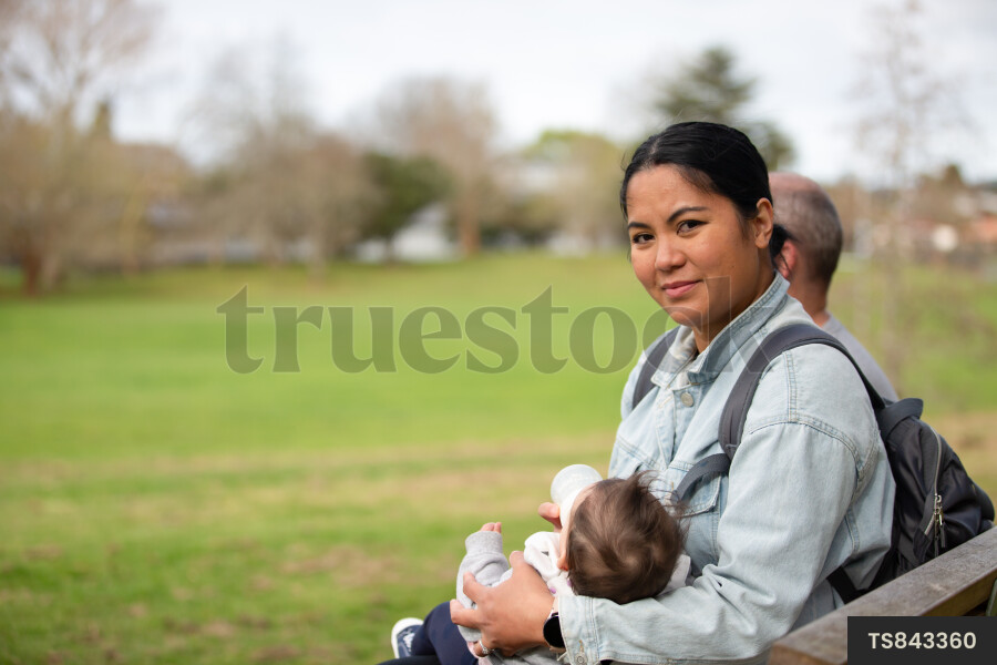Parents and Baby on Park Bench