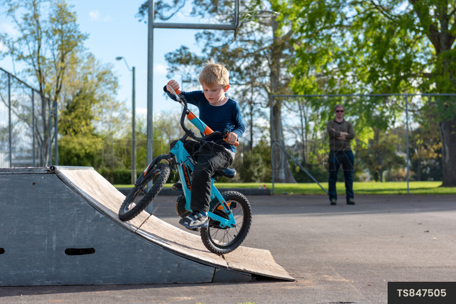 Young Boy on Bike