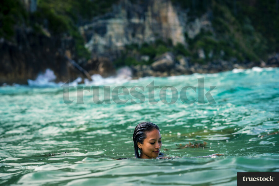 Woman Swimming at Pokohino Beach