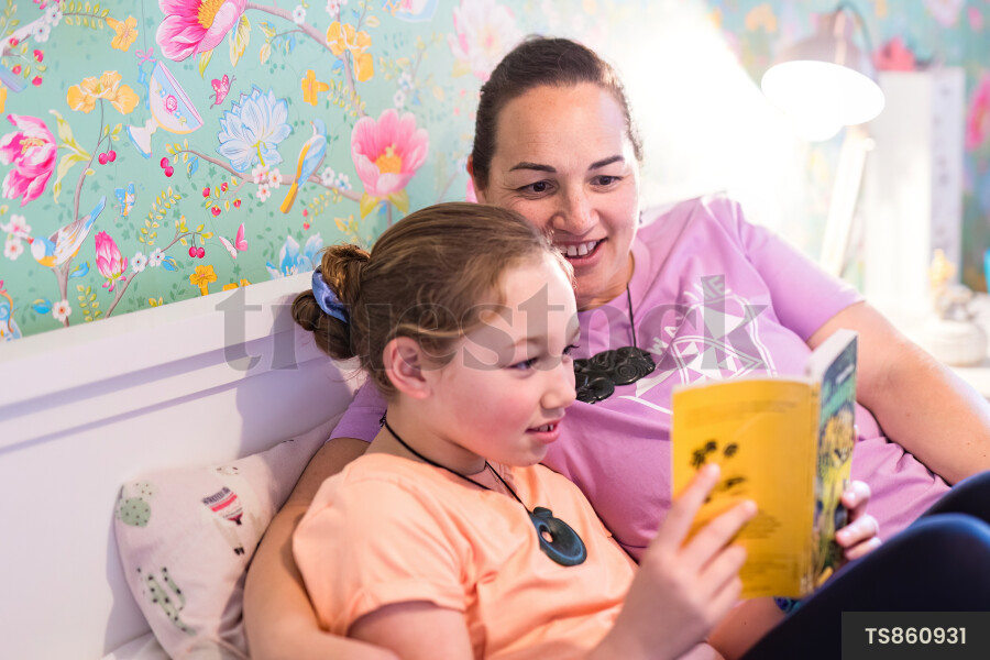 Mother and Daughter Reading Book