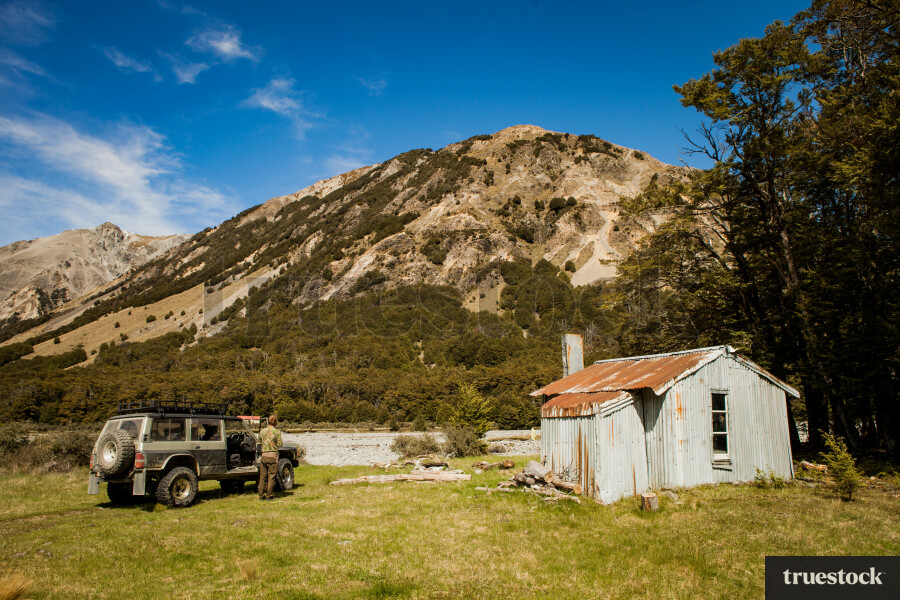 Male adult off-roading in a 4WD in the countryside