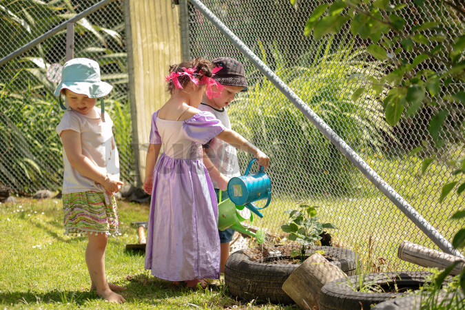 Children gardening at kindergarten