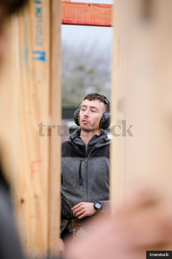 Builder onsite working on a new suburban house build