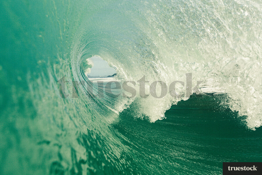 Close Up of Wave Curving and Crashing