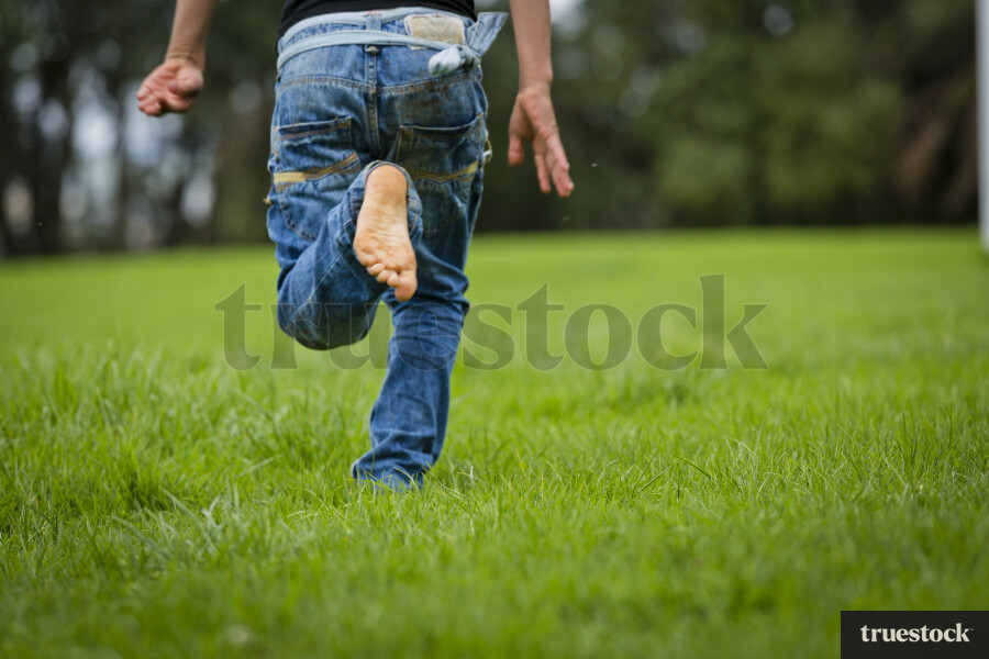 Child running on grass