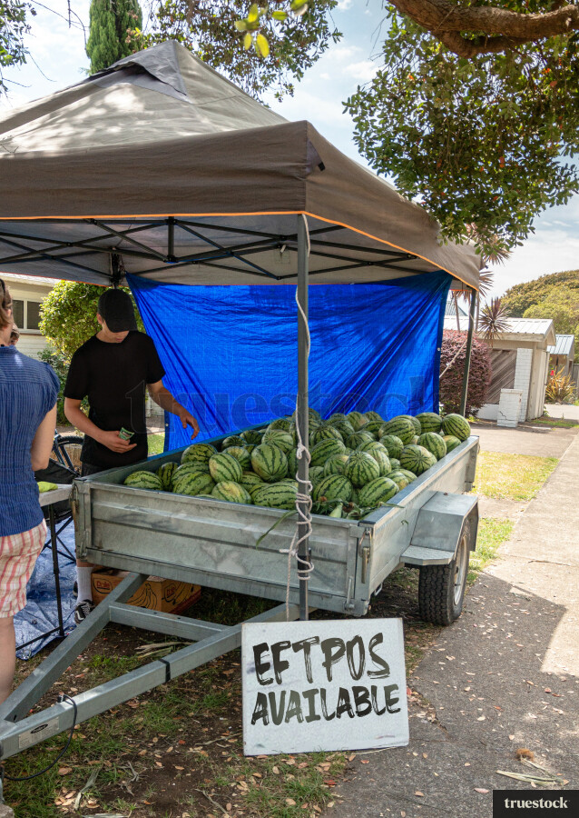 Roadside pop-up fruit shop selling watermelons