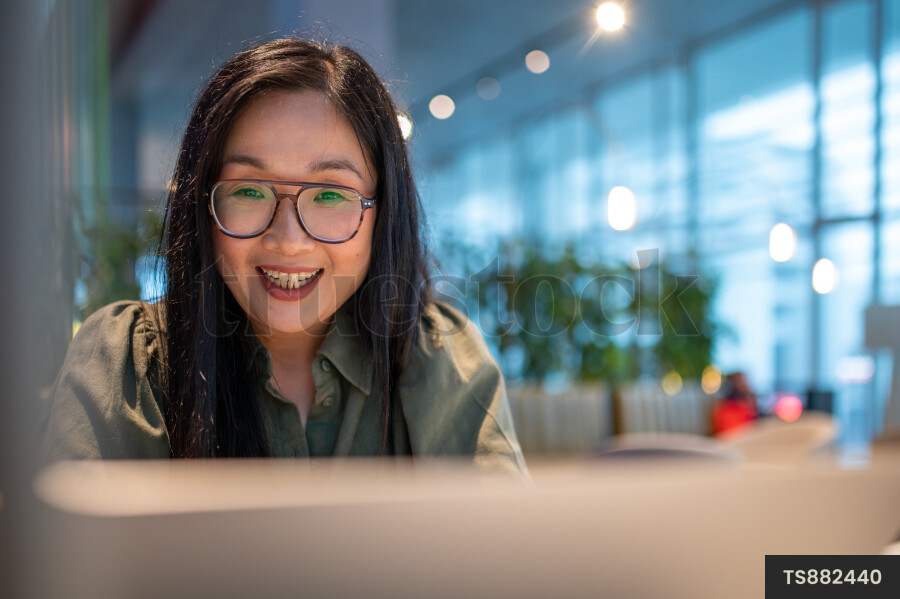 Woman Using Laptop for Work
