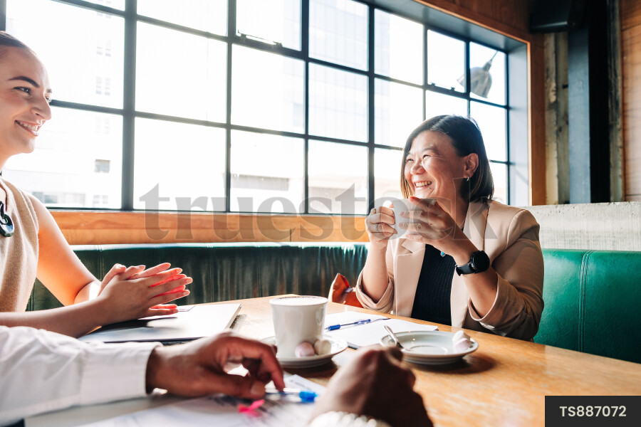 Businesspeople meeting at cafe