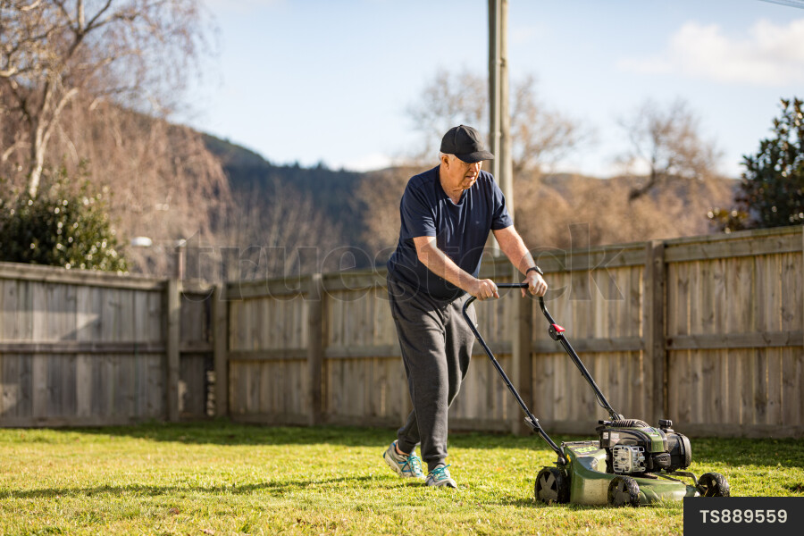 Man Mowing Lawn