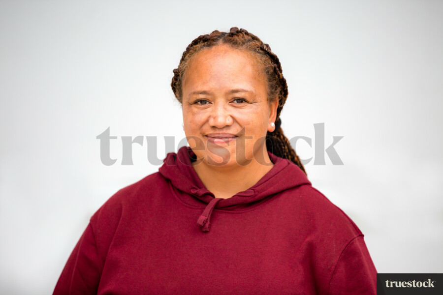 Māori Woman Outside Home