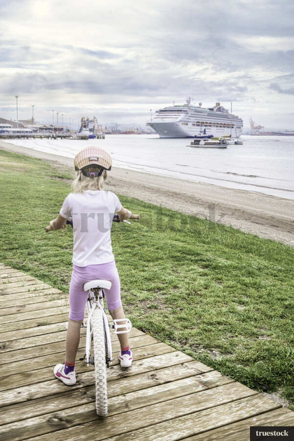 Young Girl Riding Bike