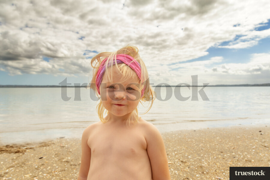 Girl Playing at the Beach