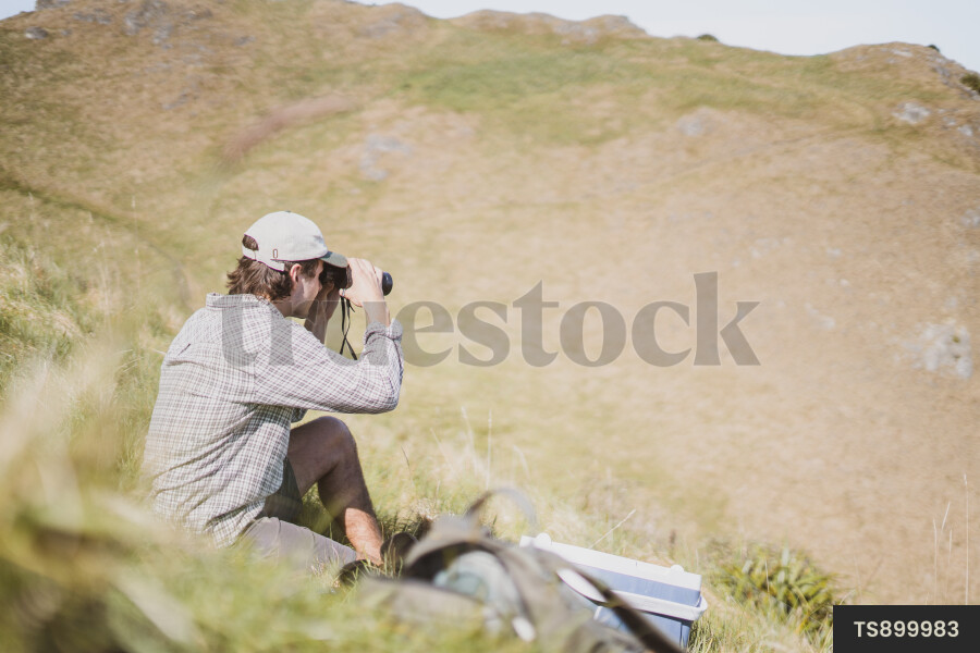 Man Using Binoculars