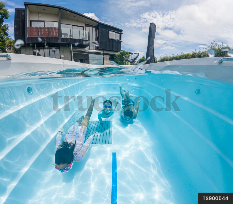 Kids Swimming in Pool