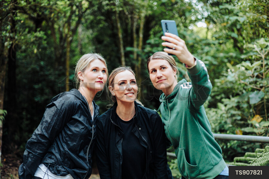 Women using Phone on Hike
