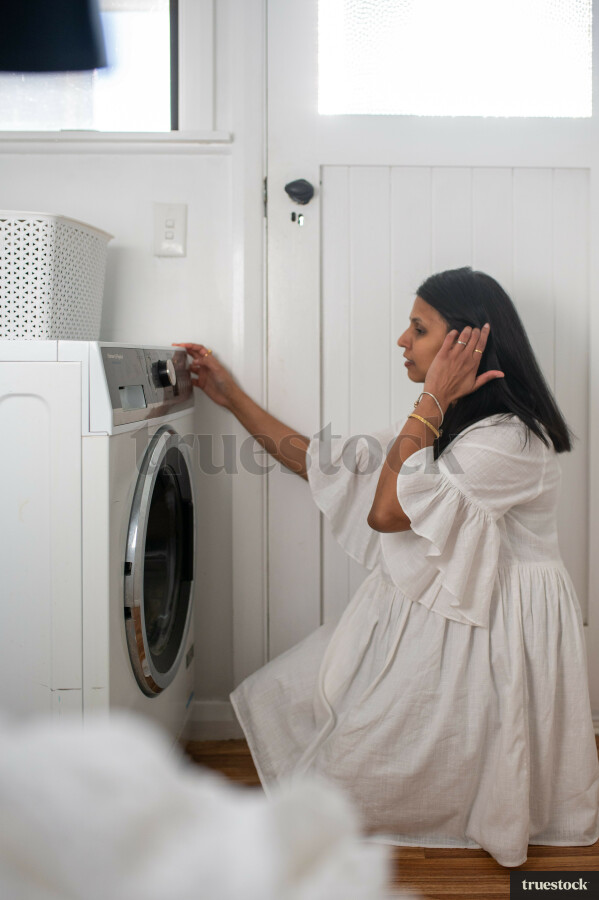 Woman Putting Washing On