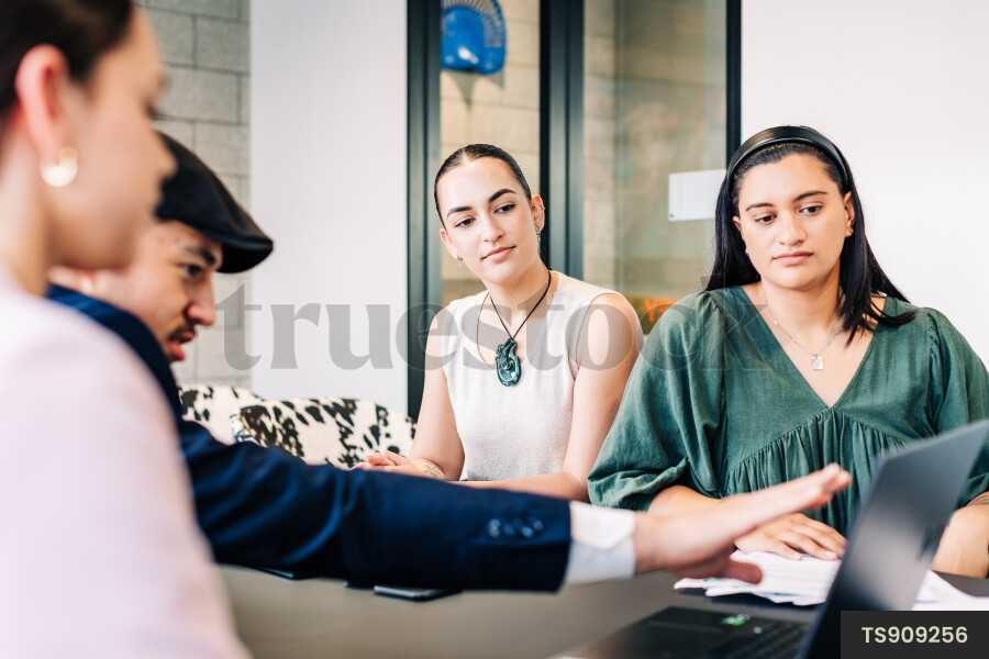 Businesspeople talking during meeting in boardroom