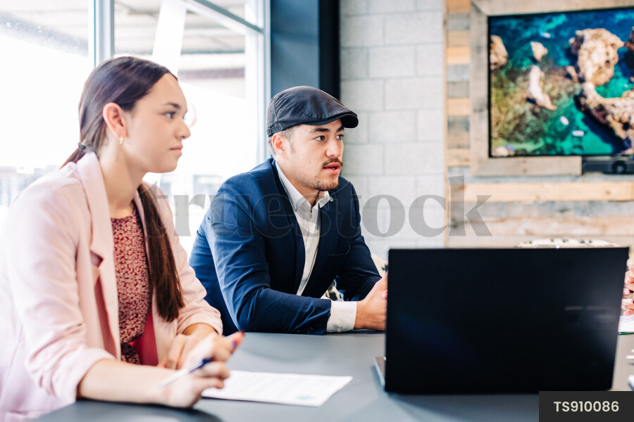 Businesspeople talking during meeting in boardroom