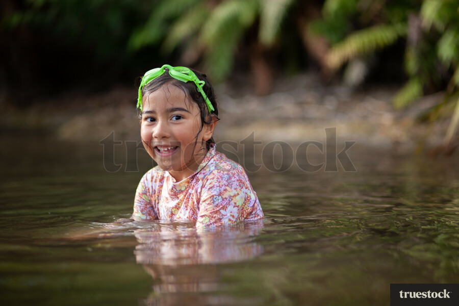 Girl swimming in lake