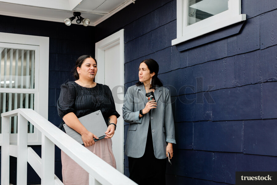 Colleagues Talking While Walking