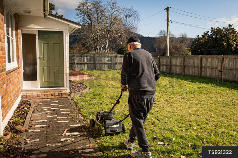 Man Mowing Lawn