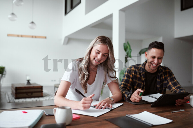 Young couple doing administration