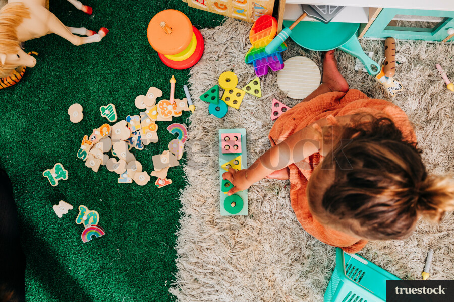 Māori girl playing in her room