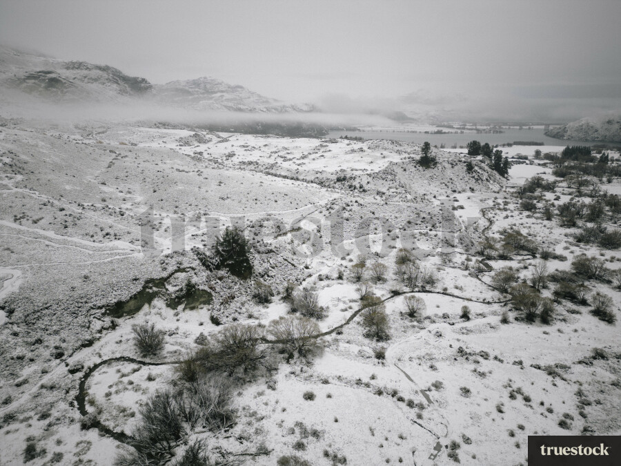 Aerial View of Snowy Farmland