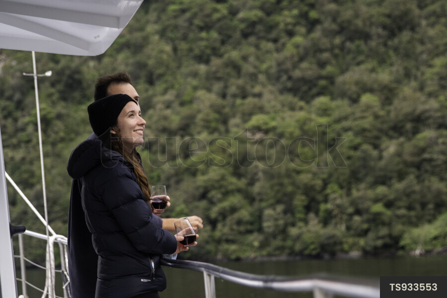 Tourists Enjoying Wine on a Boat