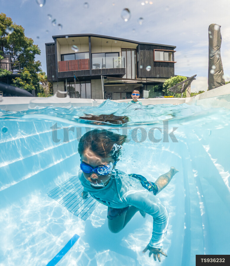 Kids Swimming in Pool