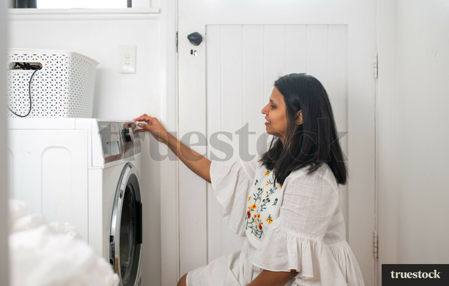 Woman Putting Washing On