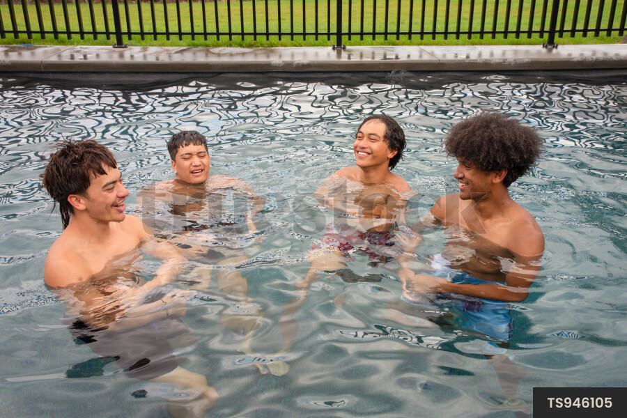Teens Playing in Pool