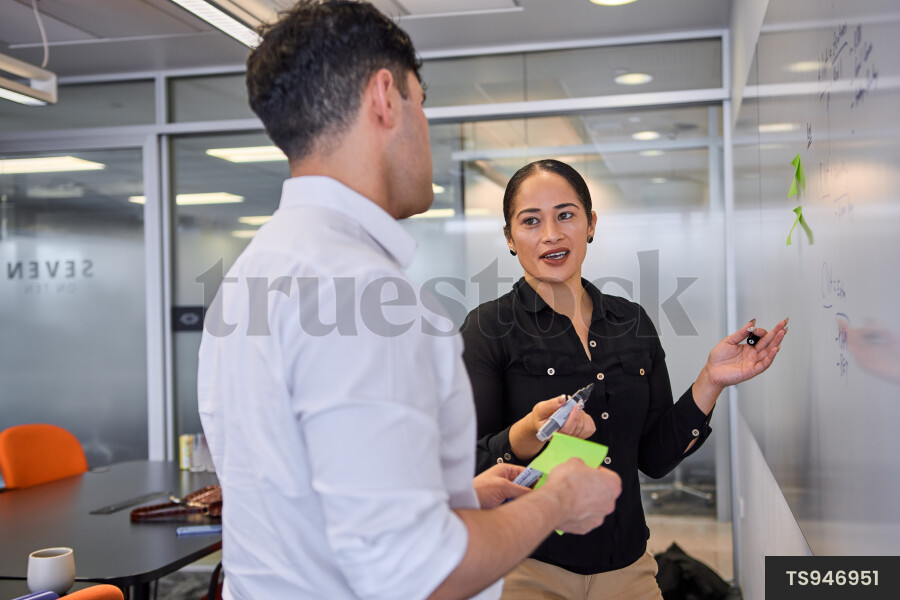 Workers Using Whiteboard